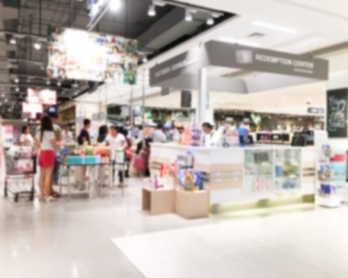 Abstract blur supermarket retail and shopping mall interior for background